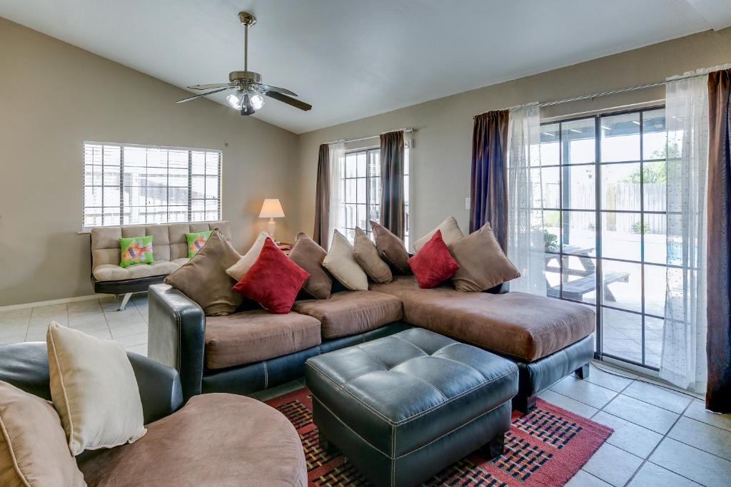 a large living room with a couch and chairs at 125B E. Lantana in South Padre Island