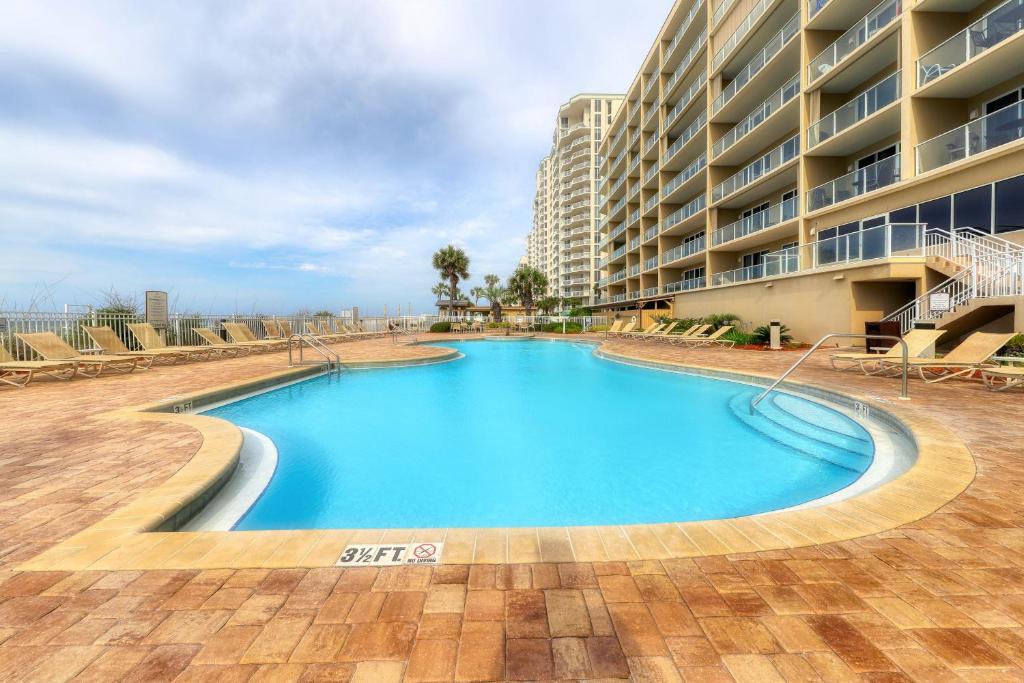 a large swimming pool in front of a building at Sterling Sands 405 Destin (Condo) in Destin