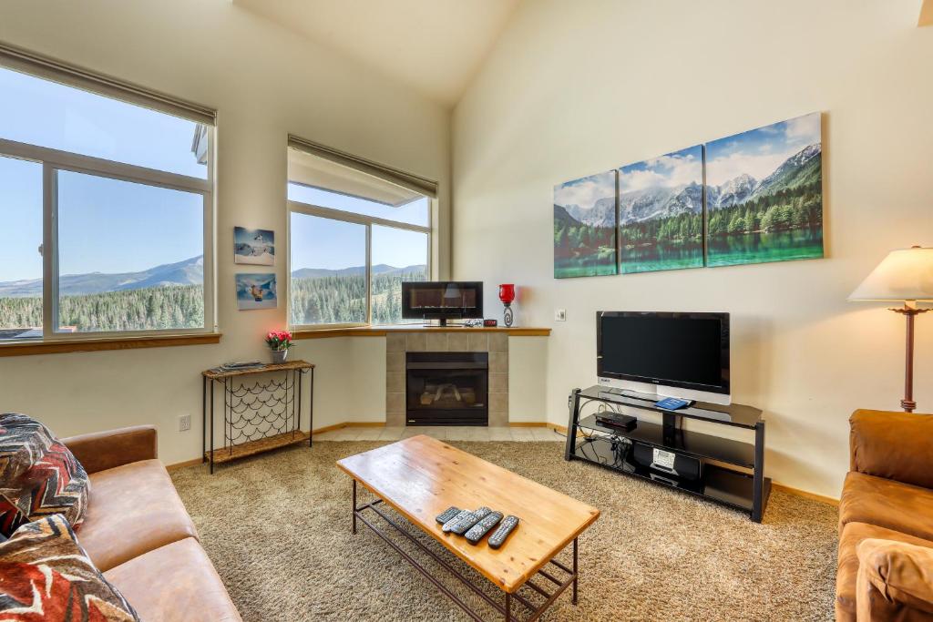 a living room with a couch and a tv at Forest Park 31E in Silverthorne