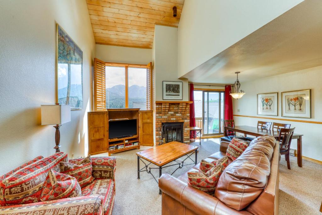 a living room with a couch and a fireplace at Cascade #54 in Durango