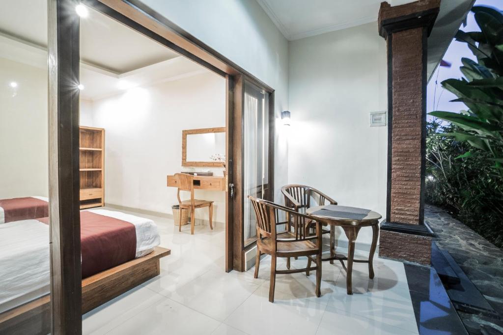 Postel nebo postele na pokoji v ubytování Sriwedari 40 Ubud