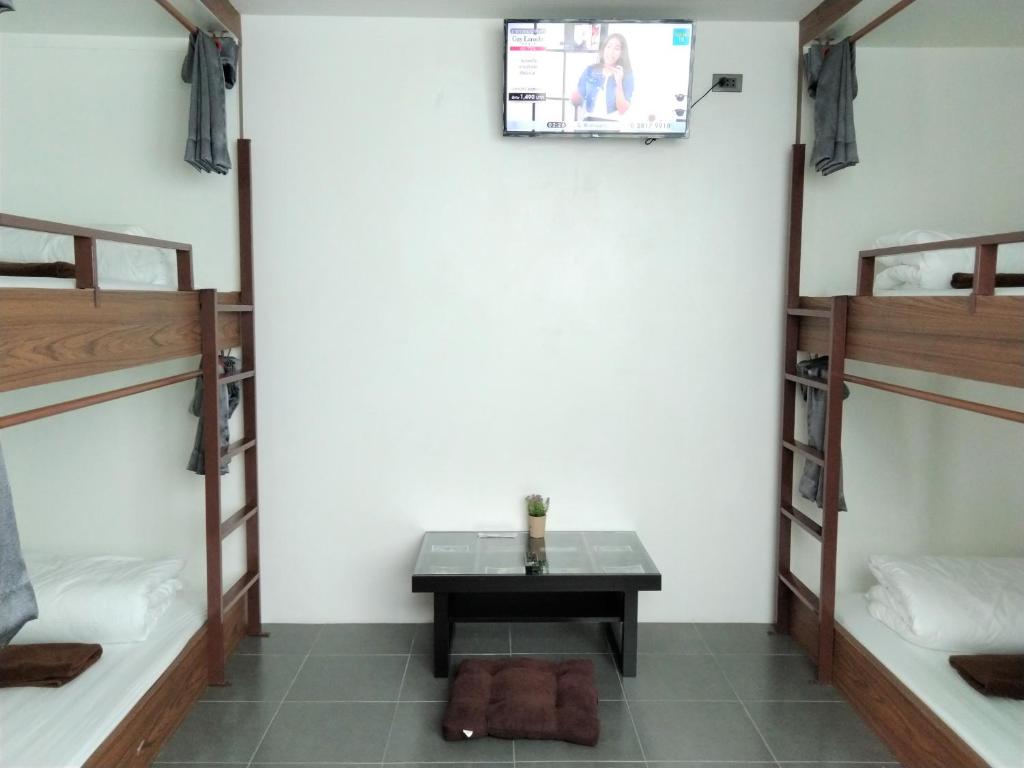 Postel nebo postele na pokoji v ubytování WEE HOSTEL