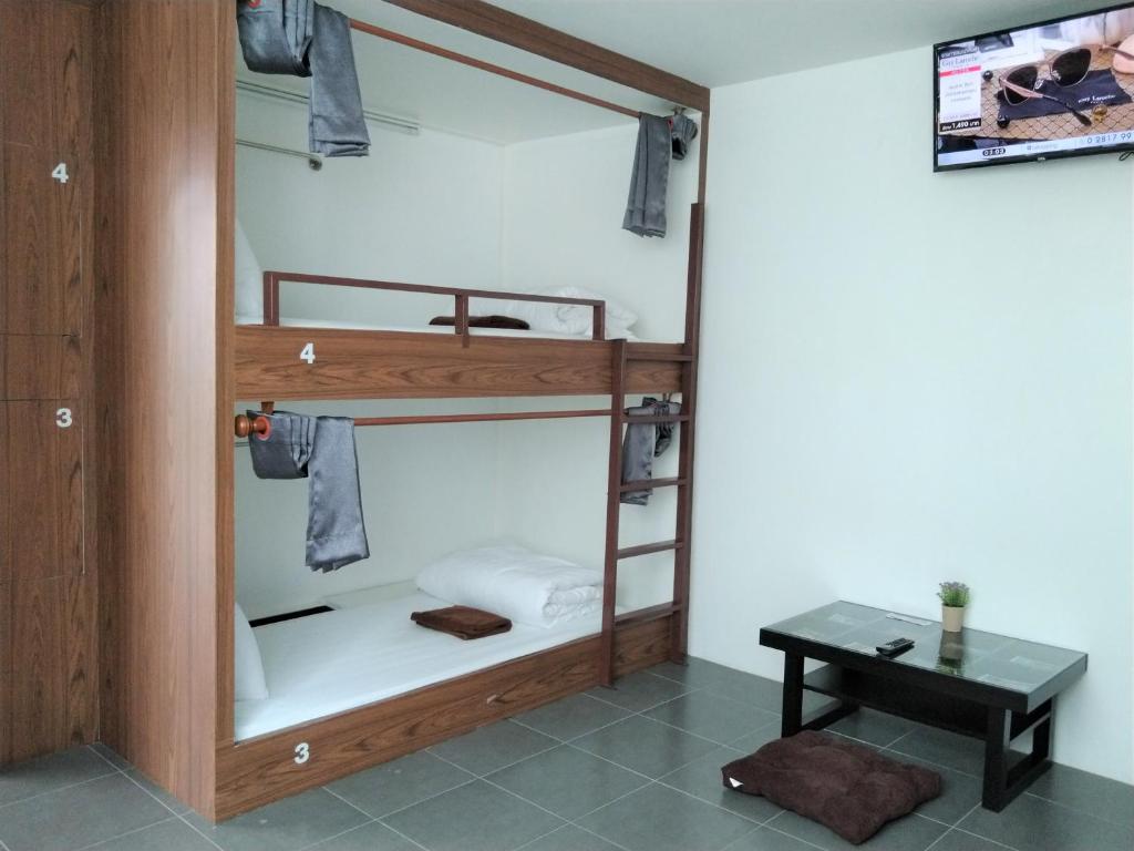 Postel nebo postele na pokoji v ubytování WEE HOSTEL