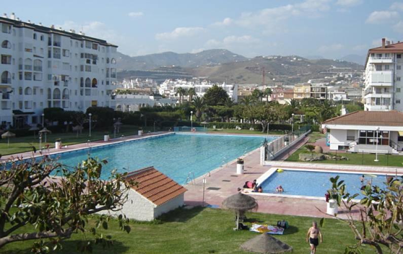 Bazén v ubytovaní Apto. Urbanización Laguna Beach, 1ª línea de playa alebo v jeho blízkosti