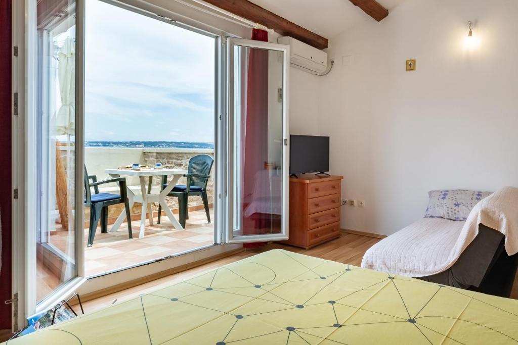 Postel nebo postele na pokoji v ubytování Sea view suite Mateo