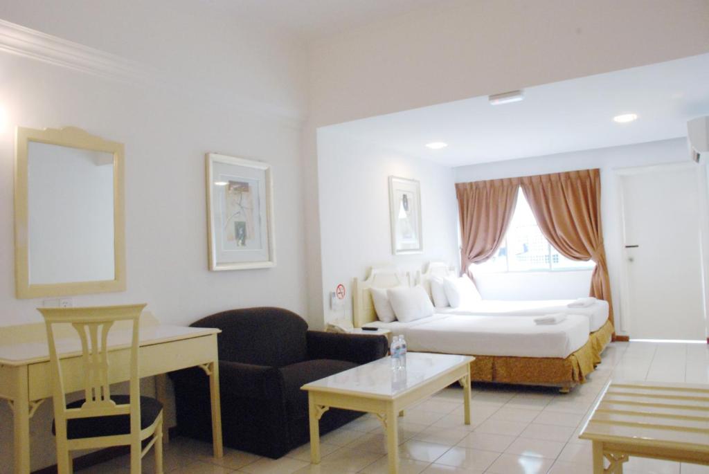 Postel nebo postele na pokoji v ubytování Promenade Service Apartment