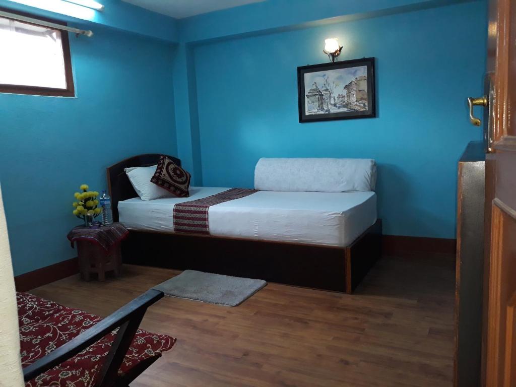 Postel nebo postele na pokoji v ubytování Subha Guest House