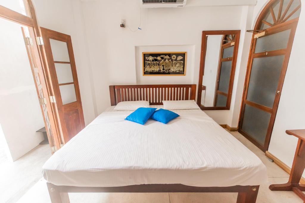 Postel nebo postele na pokoji v ubytování Fort Sapphire