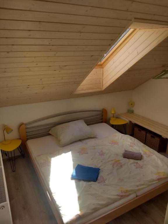 A bed or beds in a room at Chalupa Máša