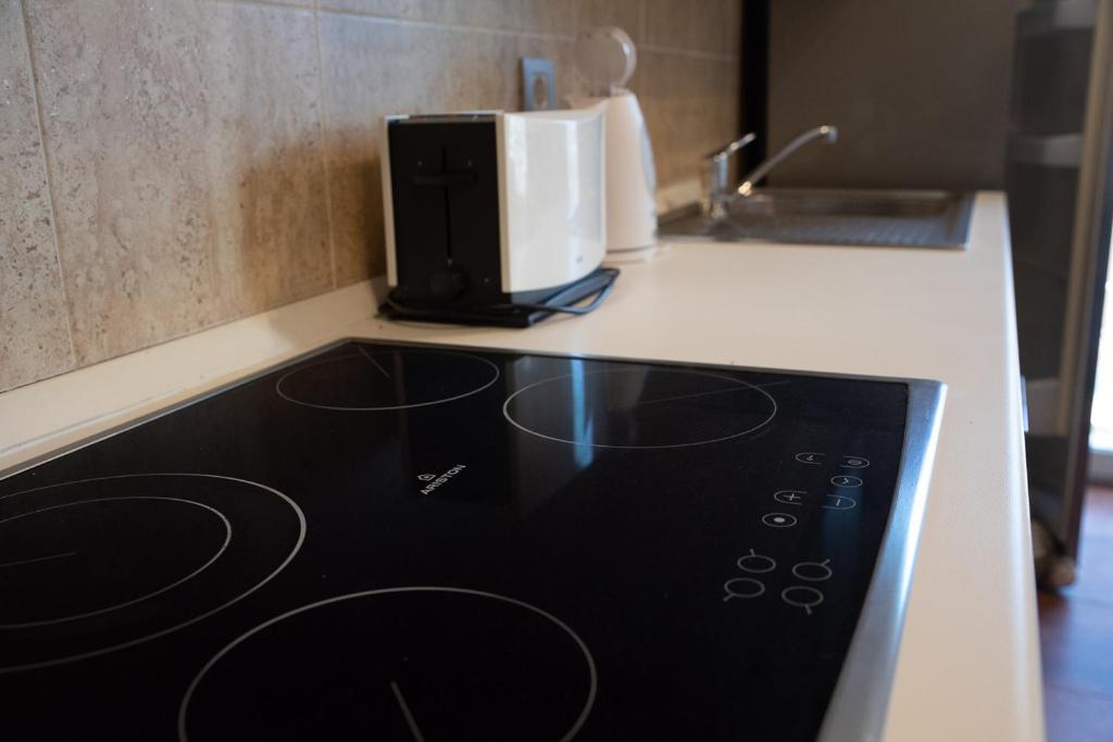 Kuchyň nebo kuchyňský kout v ubytování Casa Idilica Apartment