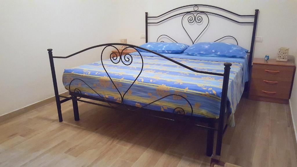 Postel nebo postele na pokoji v ubytování Casa di Irene