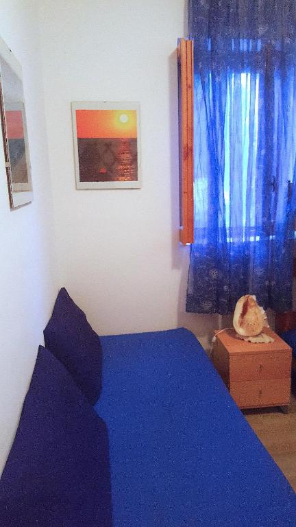 Postel nebo postele na pokoji v ubytování Casa di Irene
