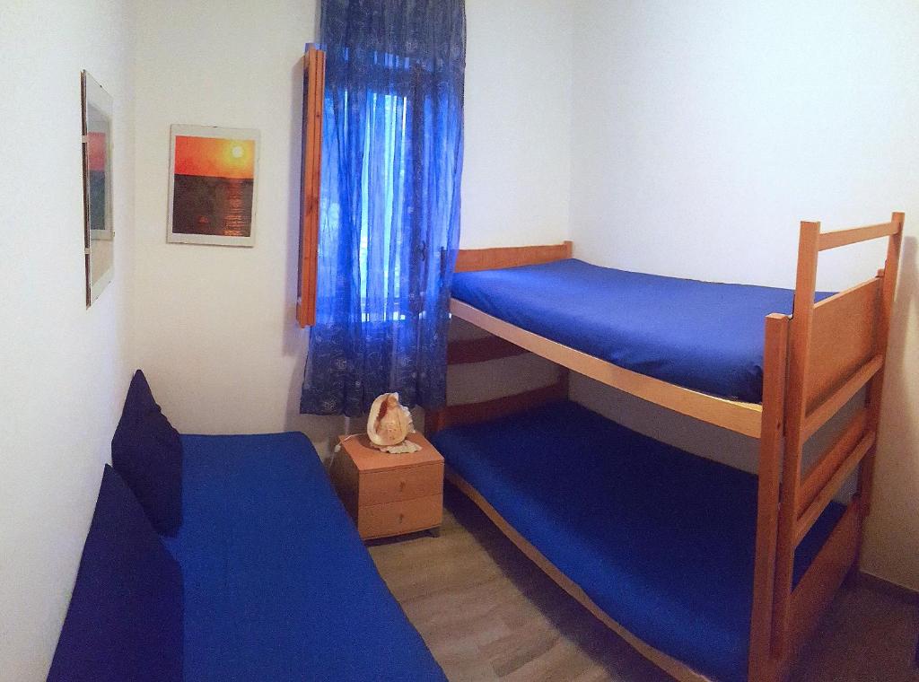 Postel nebo postele na pokoji v ubytování Casa di Irene