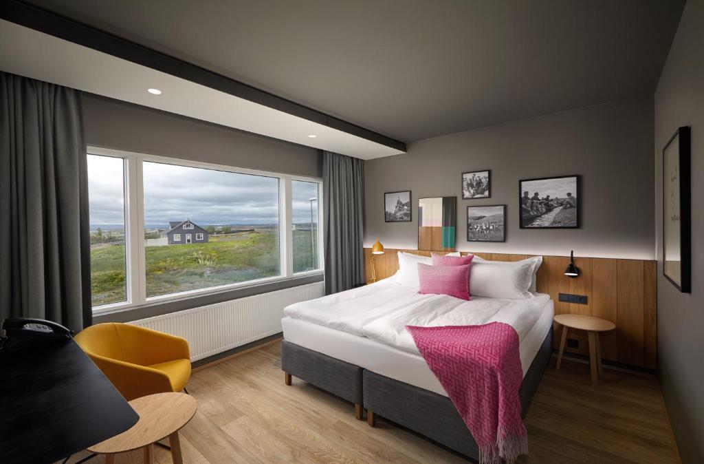 Mývatn - Berjaya Iceland Hotels tesisinde bir odada yatak veya yataklar