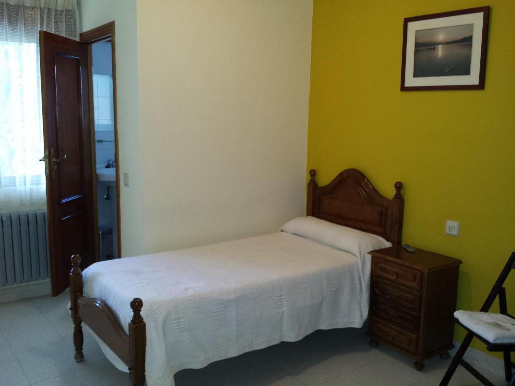 Posteľ alebo postele v izbe v ubytovaní Hostal Atila