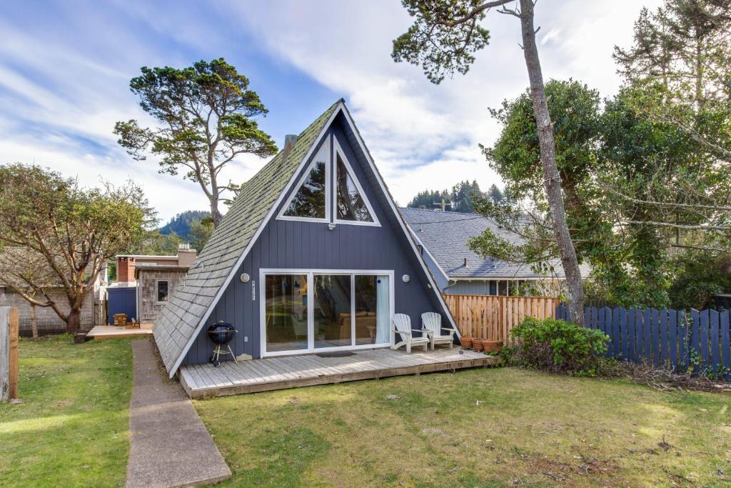 a tiny house with a gambrel roof at A-Frame Hideaway in Neskowin