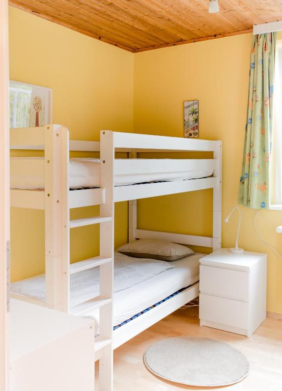 Postel nebo postele na pokoji v ubytování Ferienhaus Mountain View