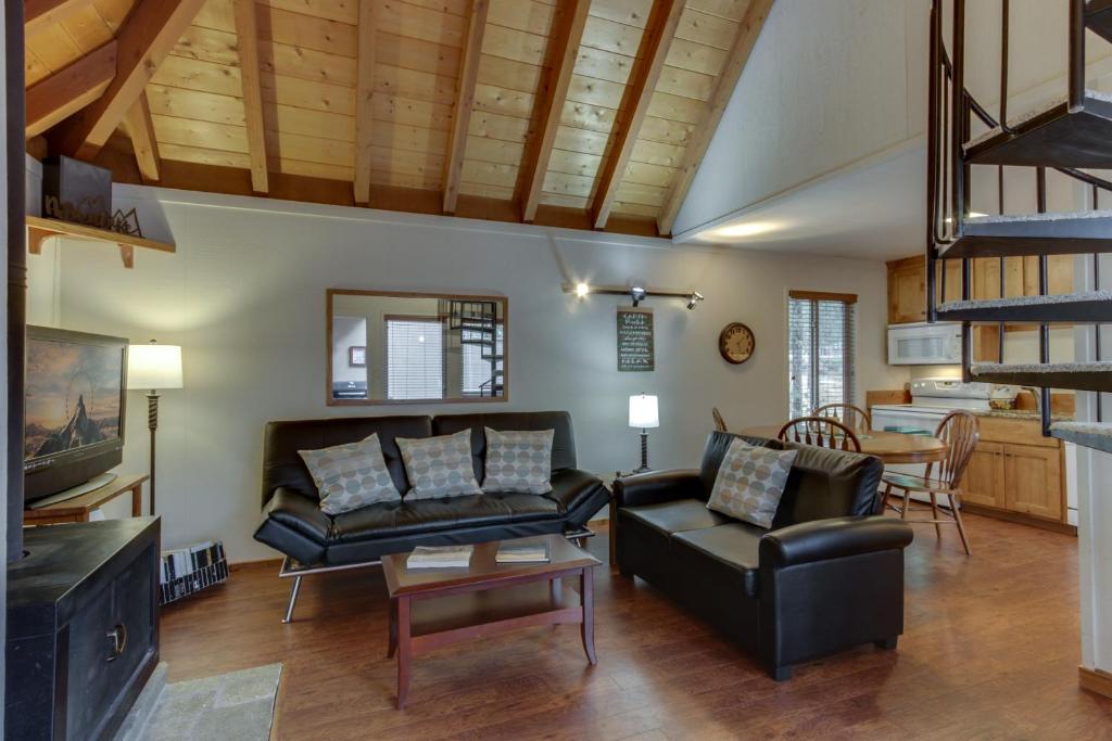 a living room with a couch and a table at 14 Antelope Lane in Sunriver