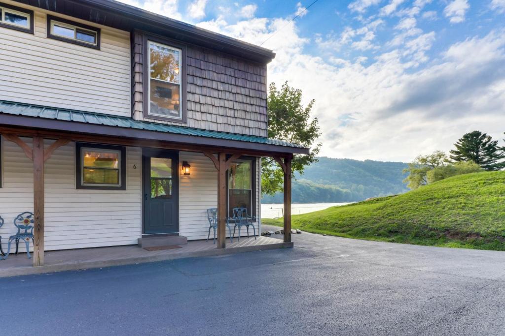 a house on a hill with a view of the water at Driftwood #6 in McHenry