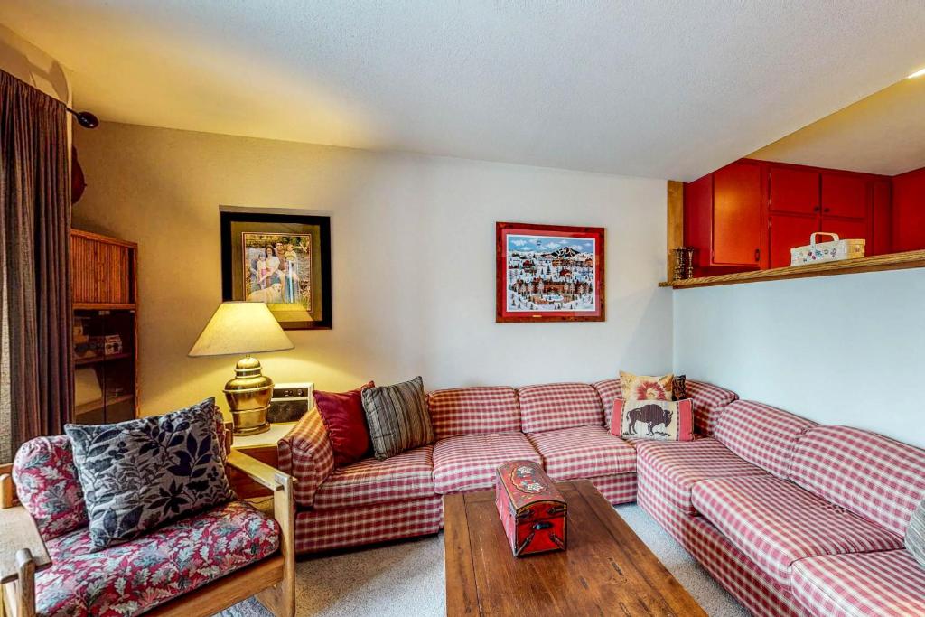 a living room with a couch and a table at Snowcreek 1538 in Sun Valley