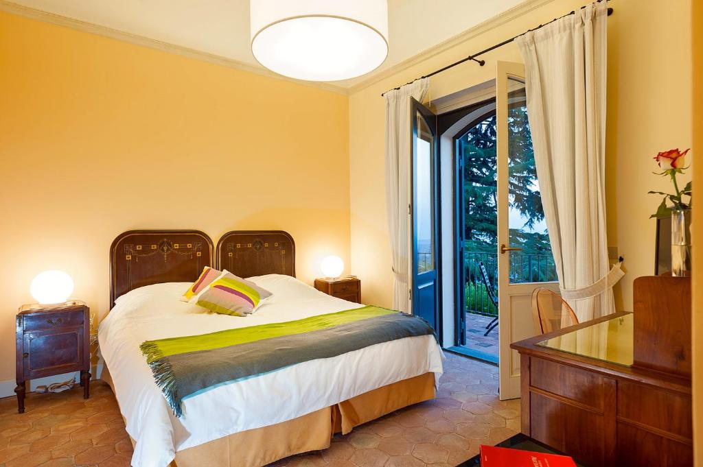 Postel nebo postele na pokoji v ubytování Wine Resort Villagrande