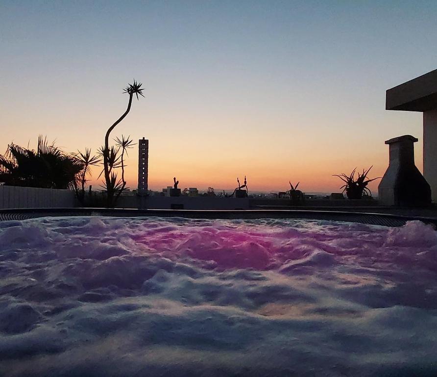 Bazén v ubytování Mesogios House Suites nebo v jeho okolí