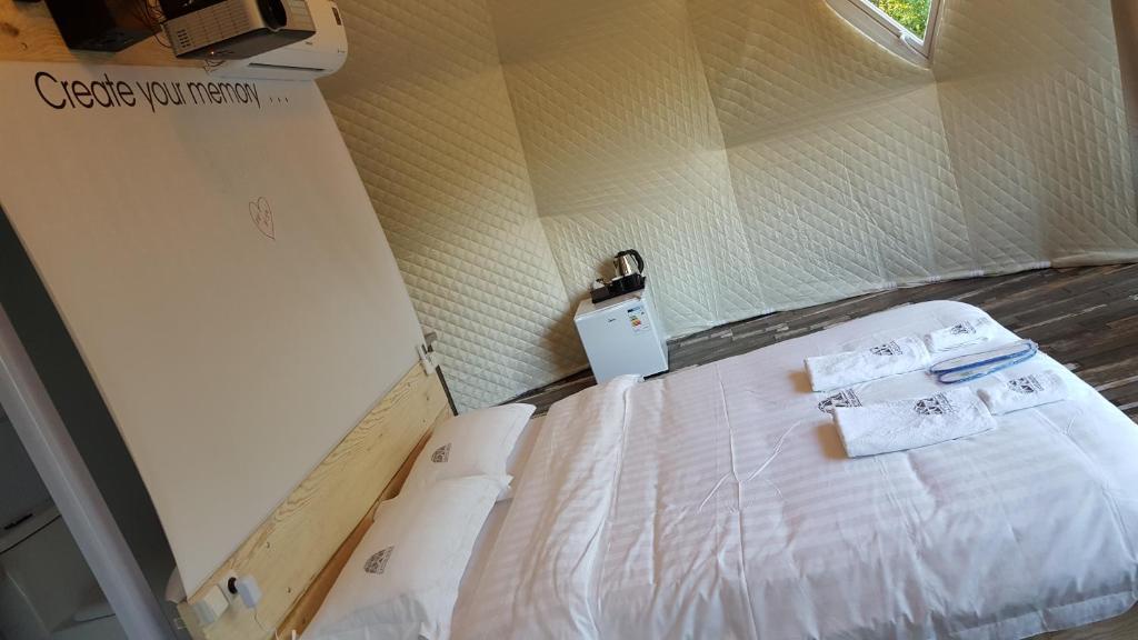 Postel nebo postele na pokoji v ubytování Glamping Georgia Krikhi