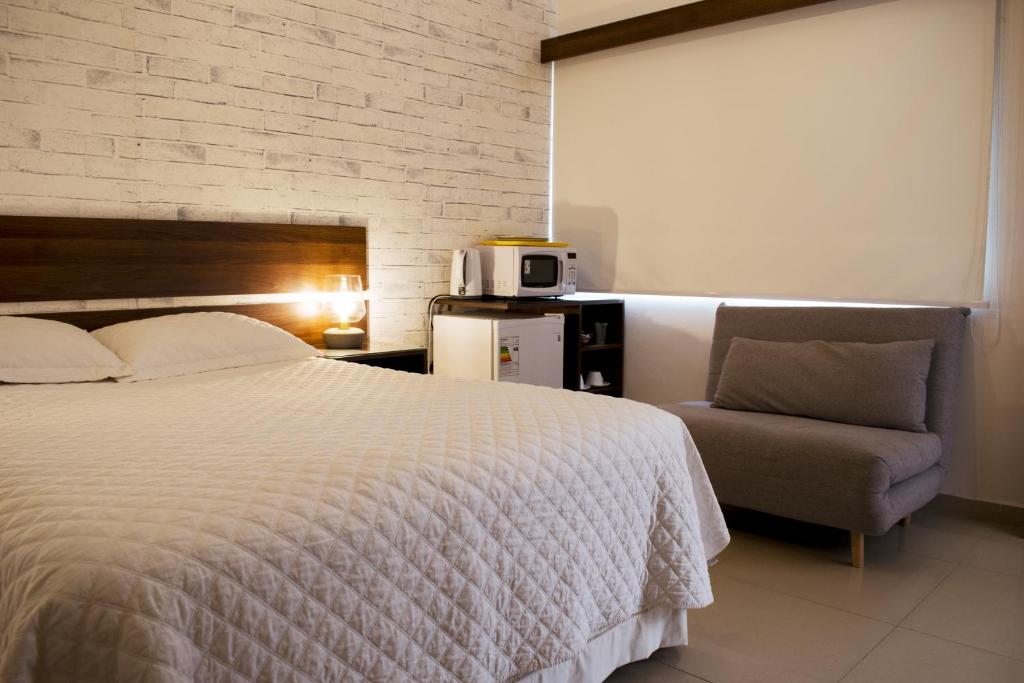 Ein Bett oder Betten in einem Zimmer der Unterkunft Sibaris