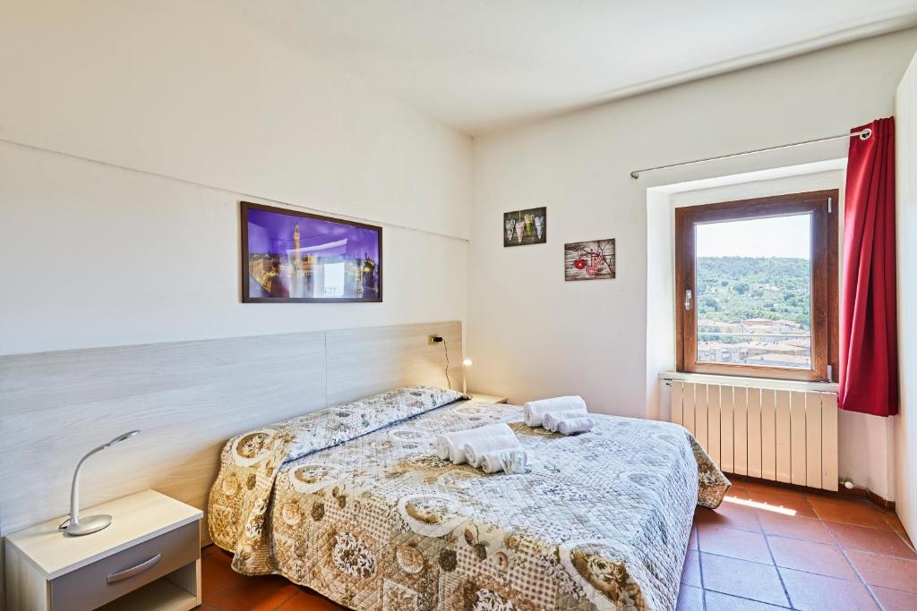 Posteľ alebo postele v izbe v ubytovaní Vacanze In Torre
