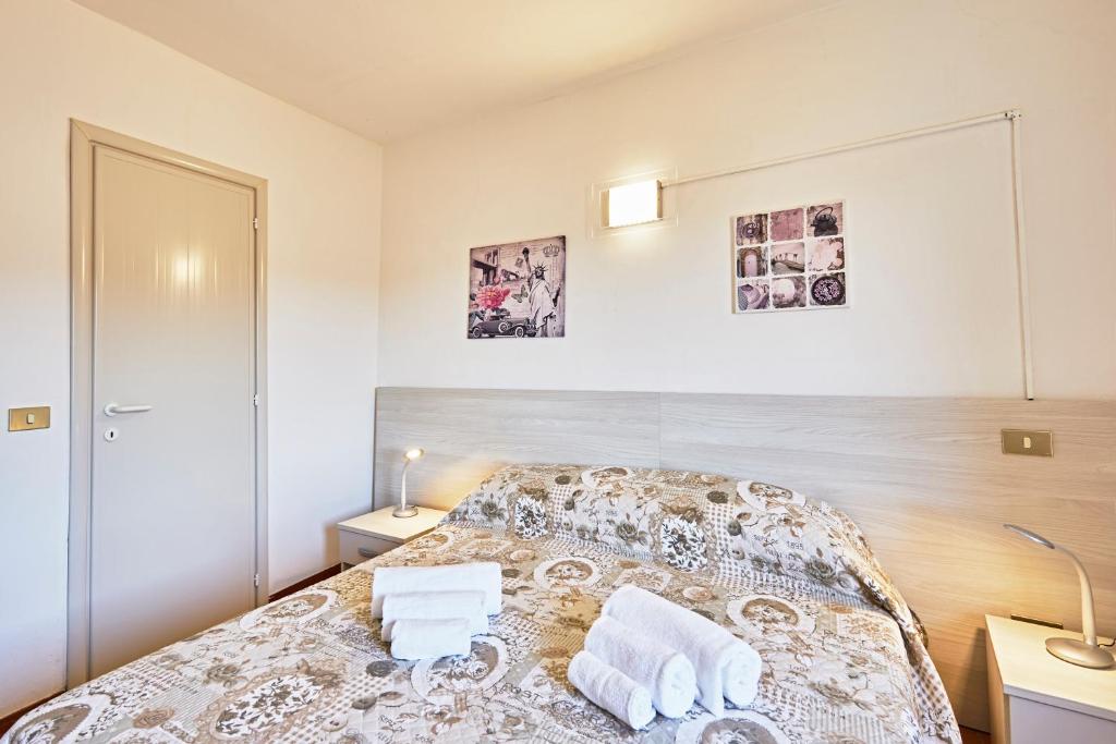 Posteľ alebo postele v izbe v ubytovaní Vacanze In Torre