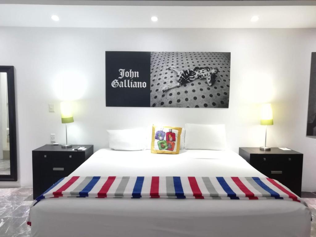 Postel nebo postele na pokoji v ubytování MayaFair Design Hotel