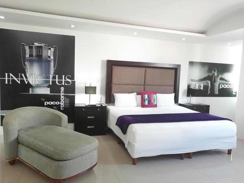 Postel nebo postele na pokoji v ubytování MayaFair Design Hotel