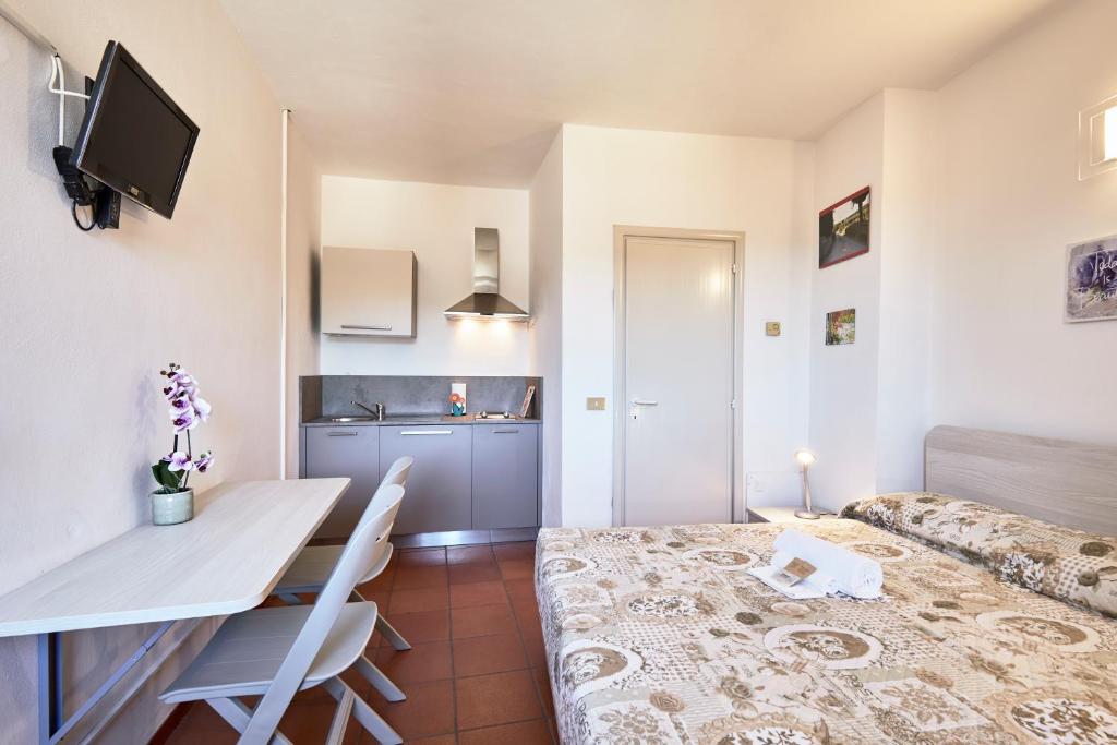 Posteľ alebo postele v izbe v ubytovaní Vacanze In Torre