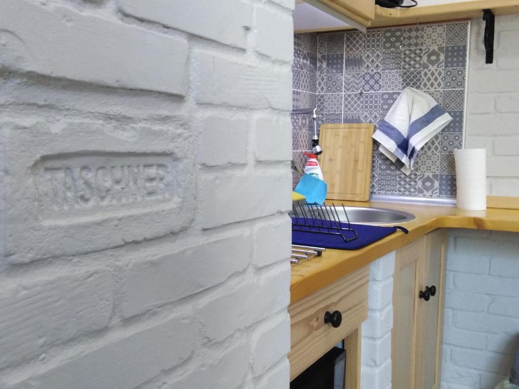 Köök või kööginurk majutusasutuses Apartmani Sirmium