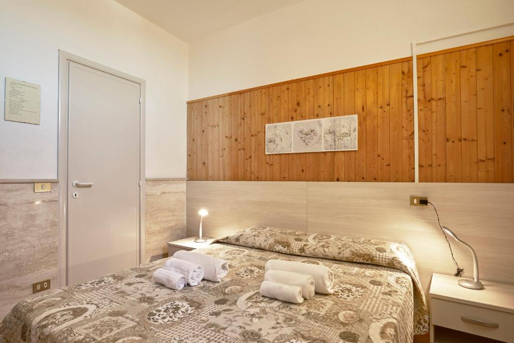 Posteľ alebo postele v izbe v ubytovaní Vacanze In Torre
