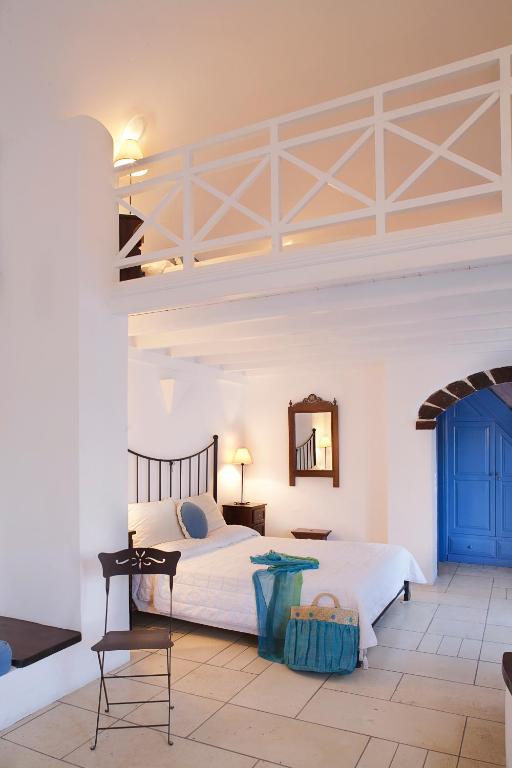 Postel nebo postele na pokoji v ubytování Tamarix Del Mar Suites
