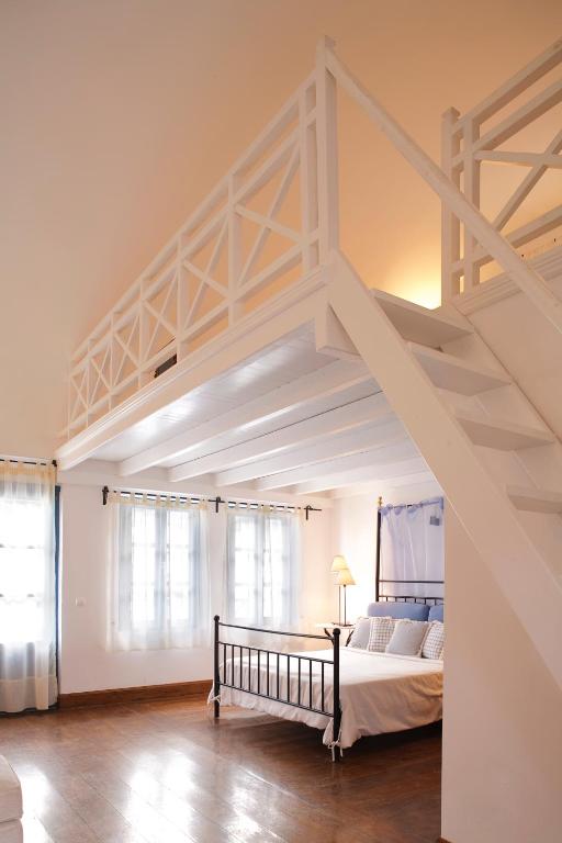 Postel nebo postele na pokoji v ubytování Tamarix Del Mar Suites