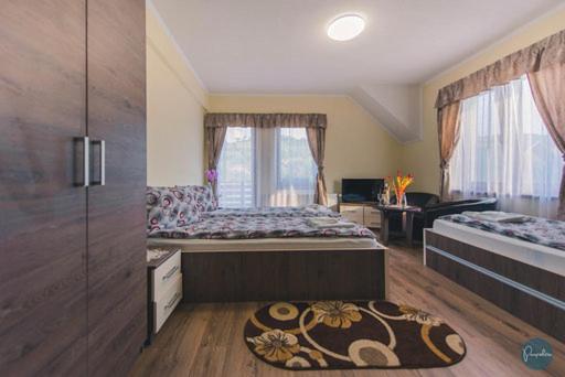 Letto o letti in una camera di Farkas Panzió