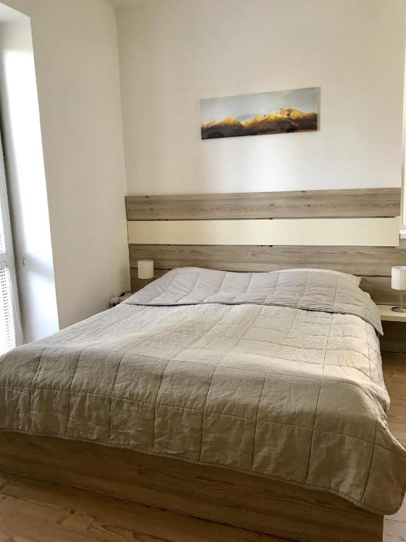 Postel nebo postele na pokoji v ubytování Vila Bellis
