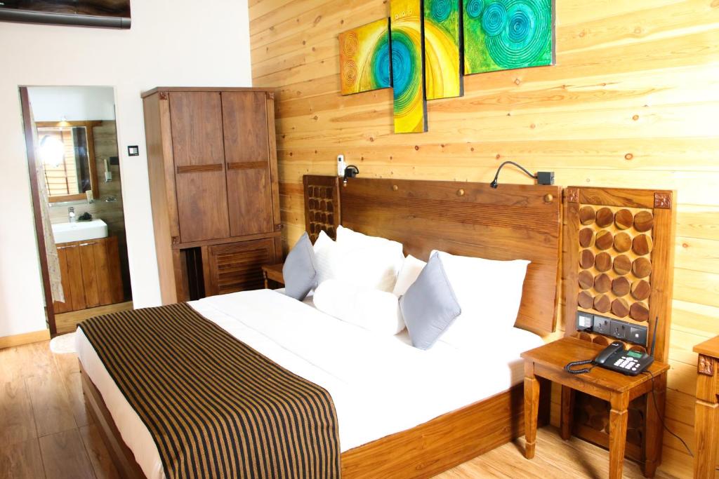 Postel nebo postele na pokoji v ubytování Aloft Grand Hotel Ella