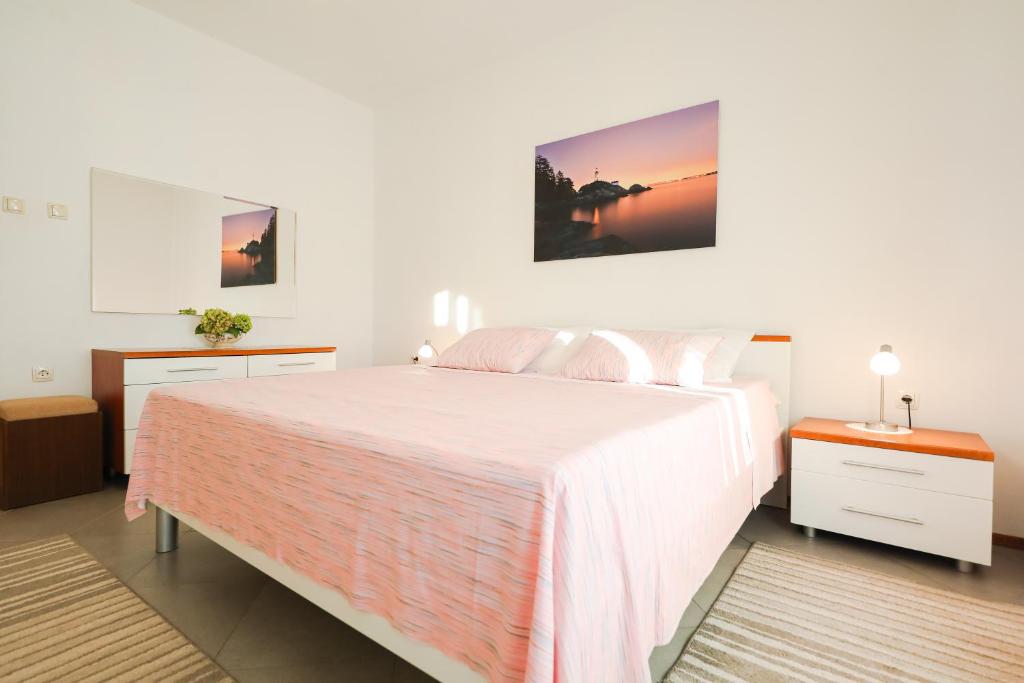 Posteľ alebo postele v izbe v ubytovaní Apartman Antisin