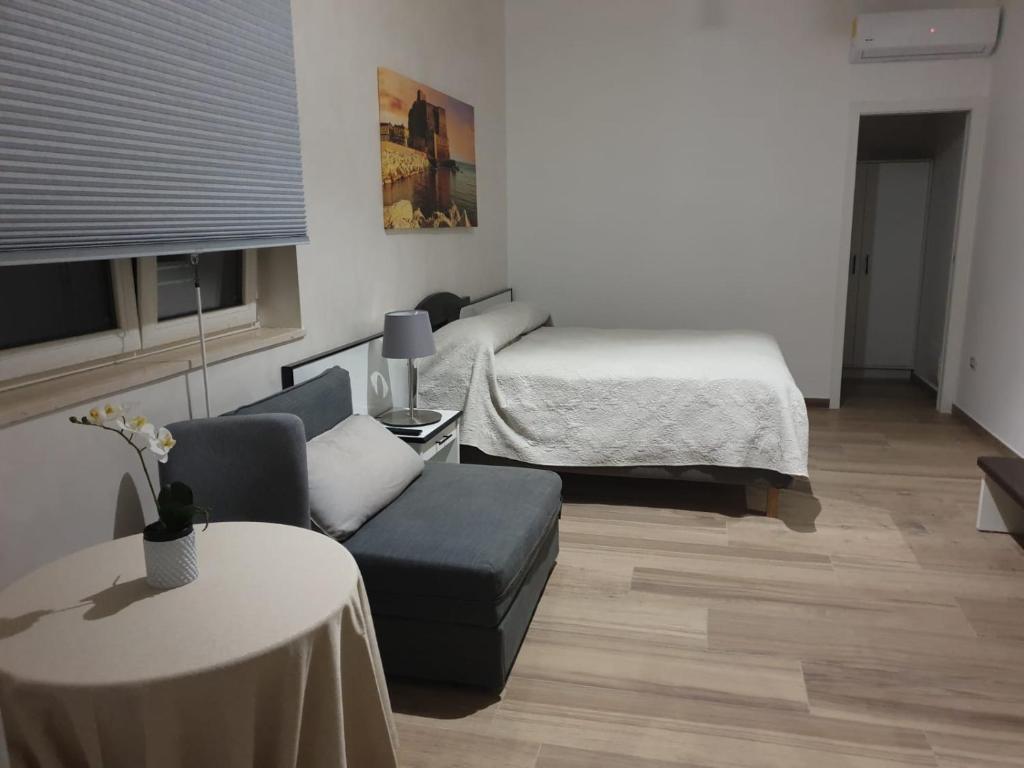 Postel nebo postele na pokoji v ubytování Residenza Carlucci
