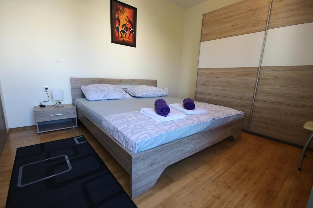 Posteľ alebo postele v izbe v ubytovaní Apartment MEL