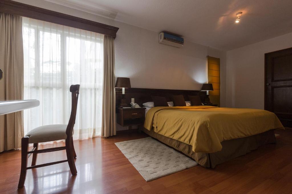 Postel nebo postele na pokoji v ubytování Casa de la Loma