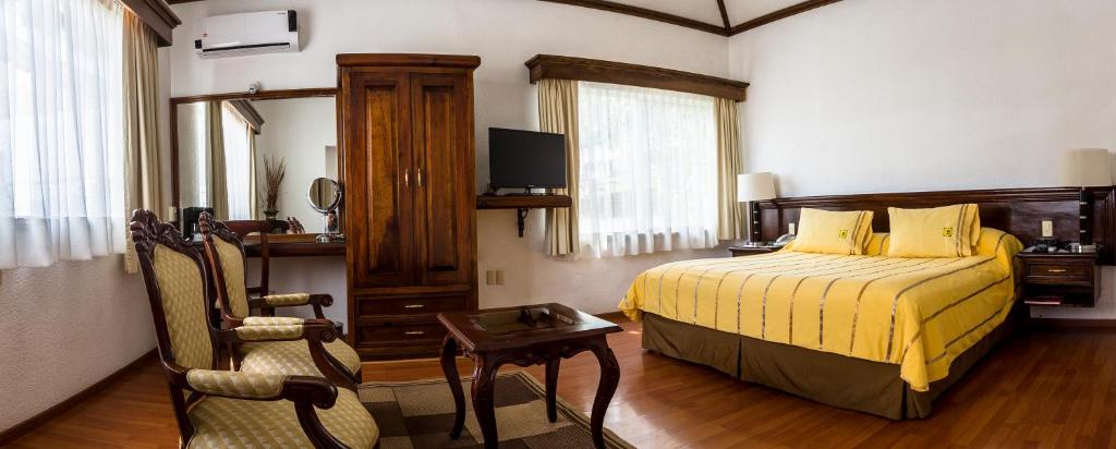 Postel nebo postele na pokoji v ubytování Casa de la Loma
