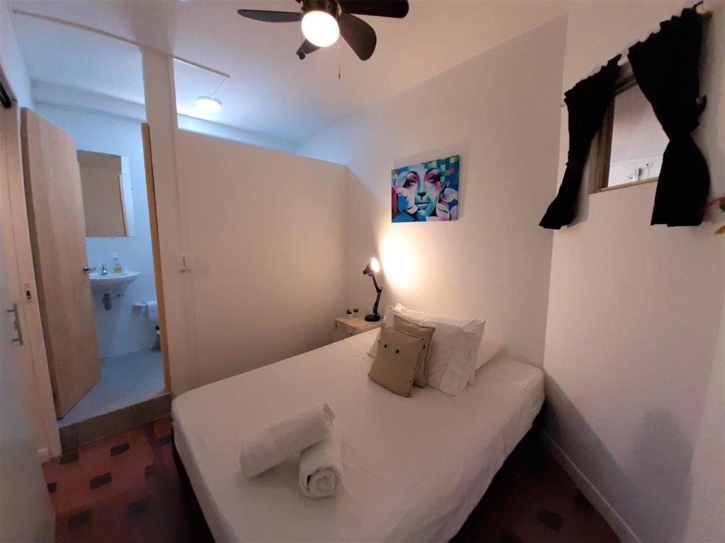 Postel nebo postele na pokoji v ubytování Noah boutique hostels Medellín