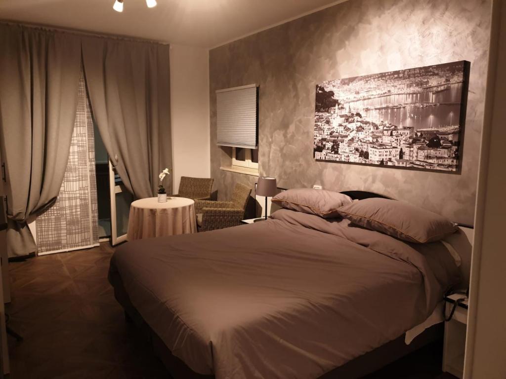 Postel nebo postele na pokoji v ubytování Residenza Carlucci