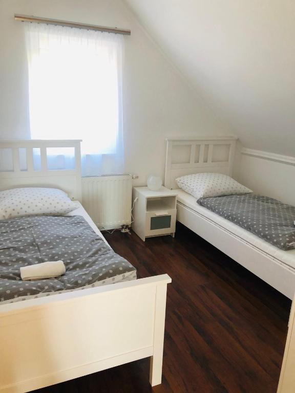 Posteľ alebo postele v izbe v ubytovaní Tihany Levendula Villa