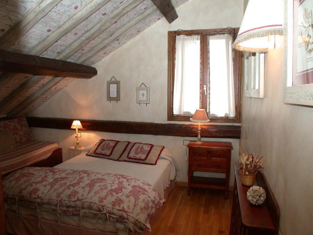 Postel nebo postele na pokoji v ubytování Hotel Casa Frauca