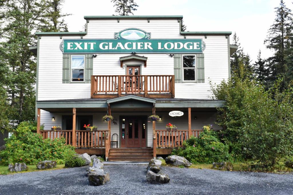 a house with a sign on the front of it at Exit Glacier Lodge in Seward